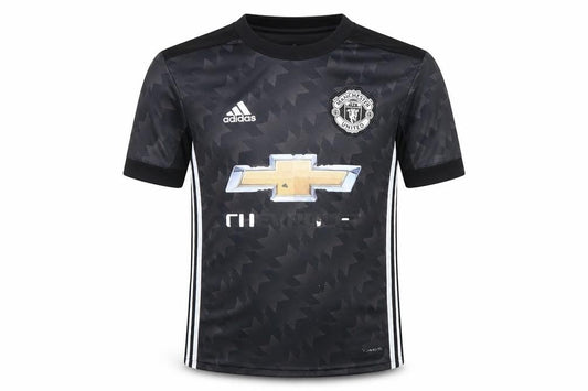 Front view of Adidas boys’ black manchester united football jersey t-shirt 9-10 years