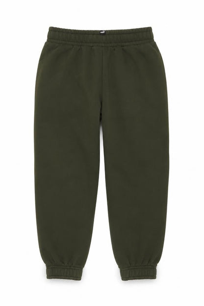 Front view of Puma boys’ green jogger trousers 10 years fleece cotton activewear