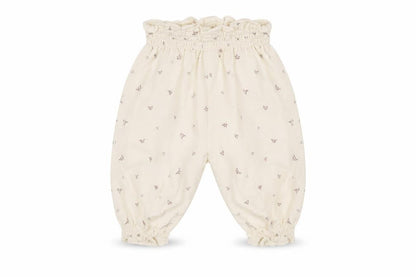 Front view of Leigh Tucker Willow Ivory Floral Paperbag Baby Trousers 0-3 Months