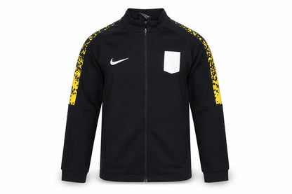 Front view of Nike boys’ black dri-fit track jacket 10-12 years full zip activewear