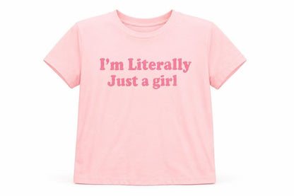 Front view of SHEIN girls’ pink graphic quote short sleeve t-shirt, size 12, years