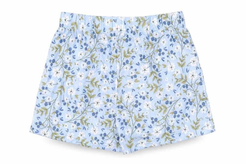 Front view of Dunnes girls’ blue floral cotton elastic waist shorts age 6