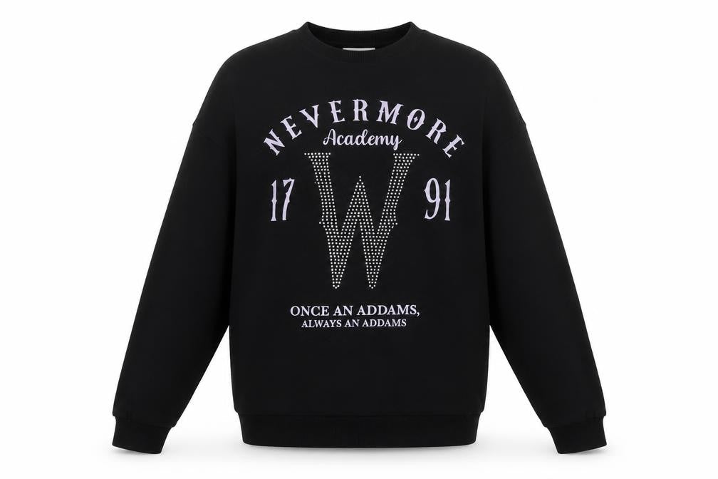 Front view of Wednesday girls’ black rhinestone nevermore sweatshirt 10-11 years