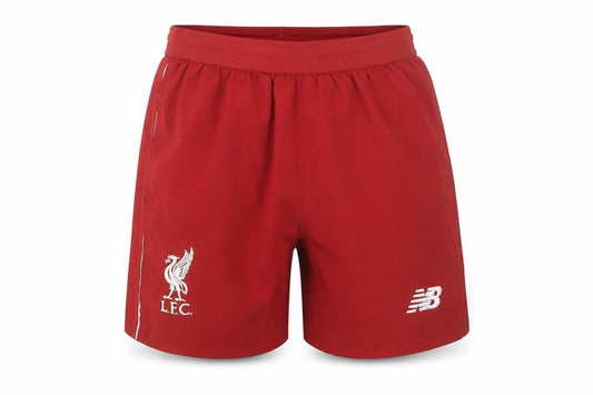 Front view of New Balance boys’ red lfc athletic football shorts, size 9, years
