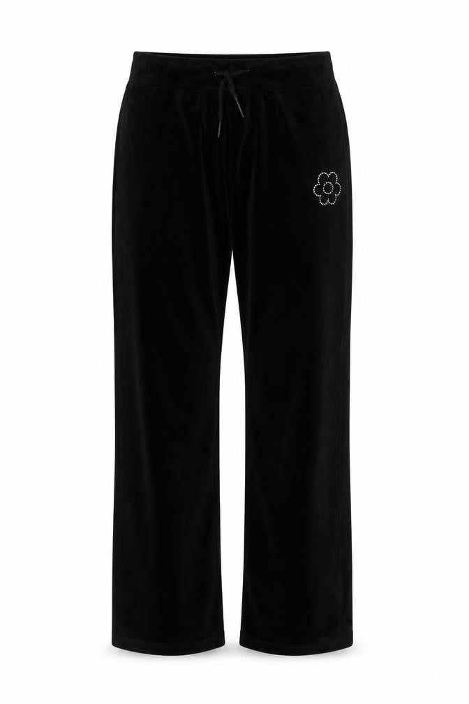 Front view of Dunnes girls’ black velour sweatpants 25in waist - flower detail