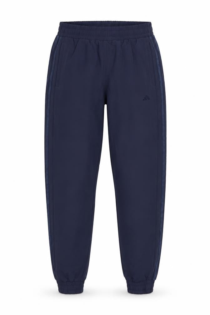 Front view of Adidas women’s navy blue jogger activewear trousers, size UK 12, polyester blend
