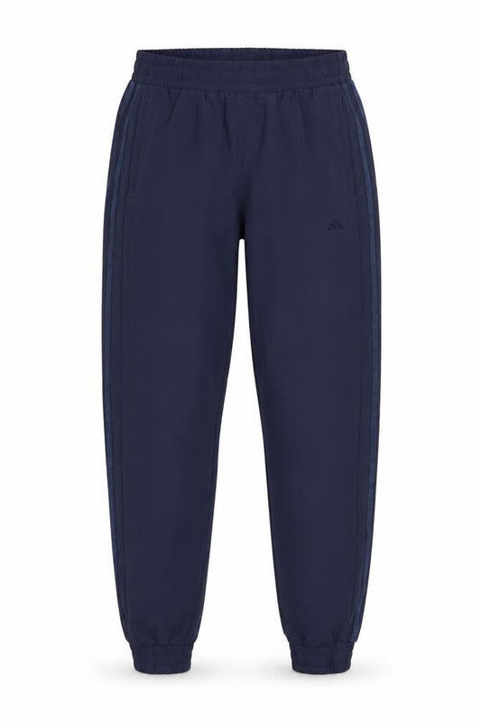 Front view of Adidas women’s navy blue jogger activewear trousers, size UK 12, polyester blend