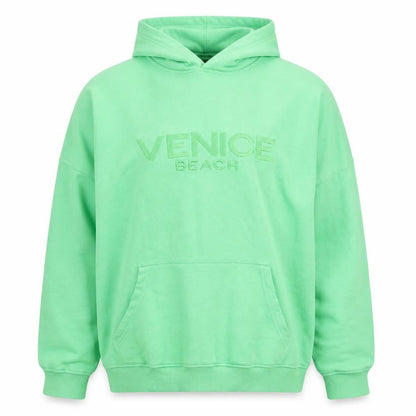 Front view of PRETTYLITTLETHING unisex green pullover hoodie l relaxed fit embroidered