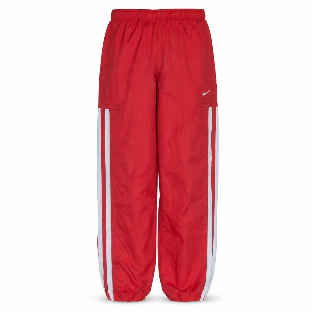 Front view of Nike boys’ red track pants 10 years elastic waist side stripe activewear