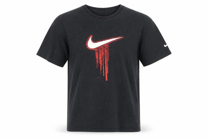 Front view of Nike Teens Black Red Drip Logo Graphic Short Sleeve Crew Neck T-Shirt L