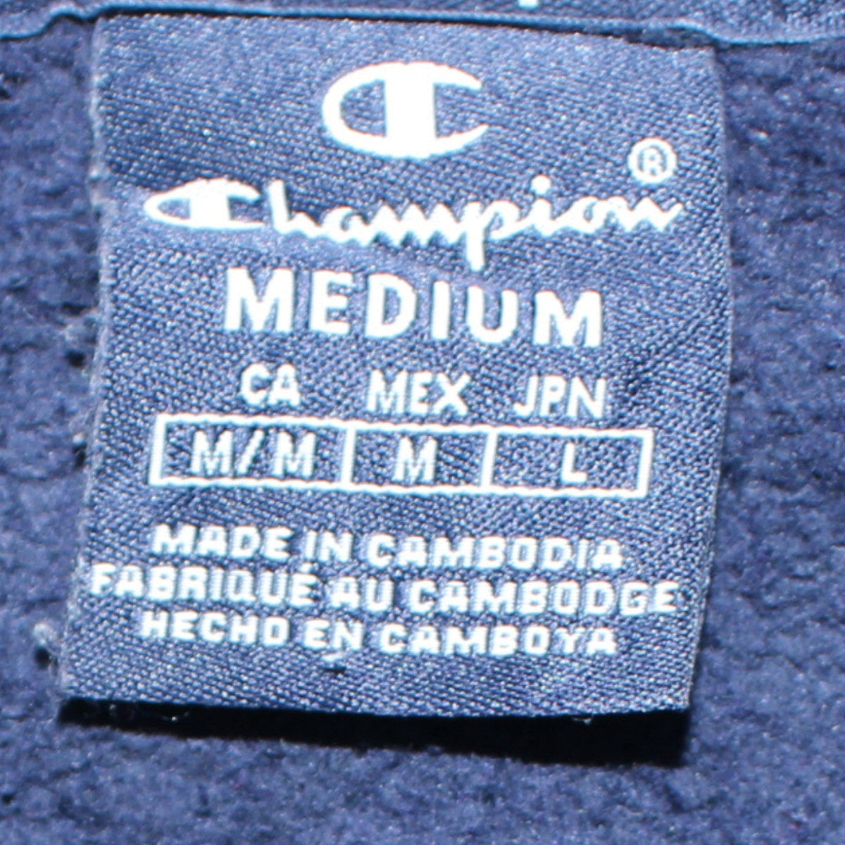 Close-up detail of Champion Men's Blue Medium Pullover Hoodie Logo Sweatshirt