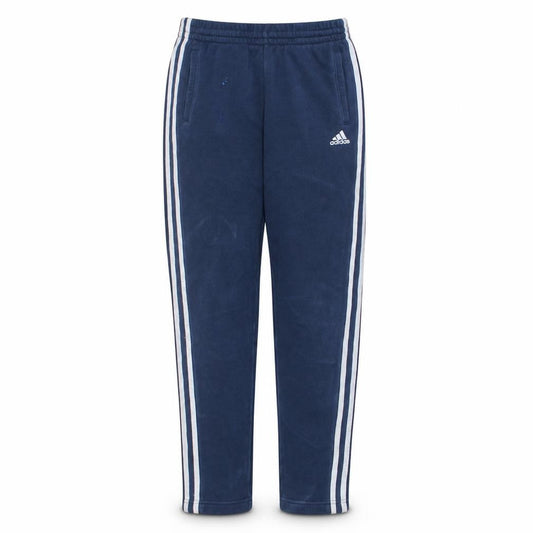 Front view of adidas boys’ blue 13-14 years track pants with side stripes