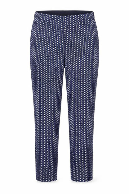 Front view of Dunnes women’s blue geometric slim tapered trousers, size UK 10