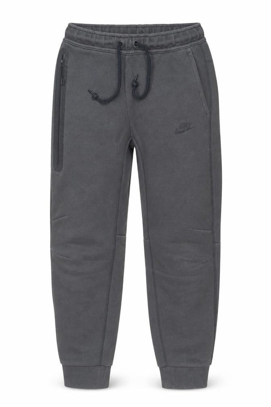 Front view of Nike boys’ grey jogger sweatpants s activewear tapered fleece trousers