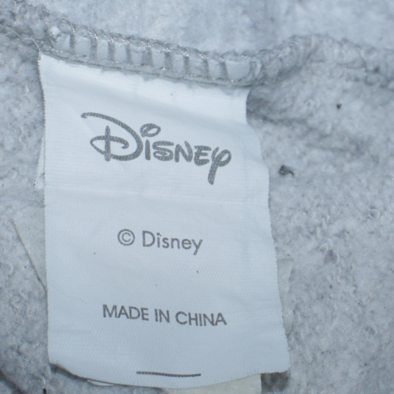 Disney Women’s Grey Stitch Sweatshirt Size M 12/14 Crew Neck