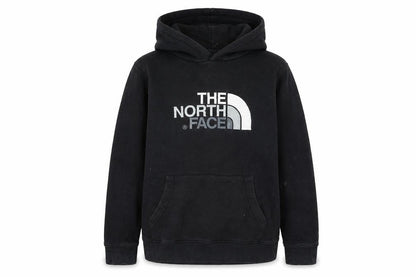 Front view of The North Face girls’ black xl pullover hoodie with logo print