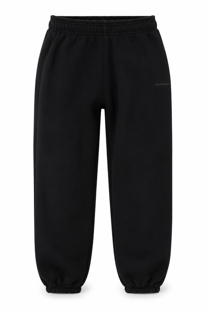 Front view of Brother and Kin boys’ black jogger trousers l fleece elastic waist casual