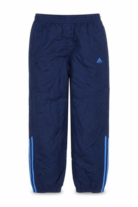 Front view of Adidas boys’ blue track pants 10 years regular fit activewear trousers