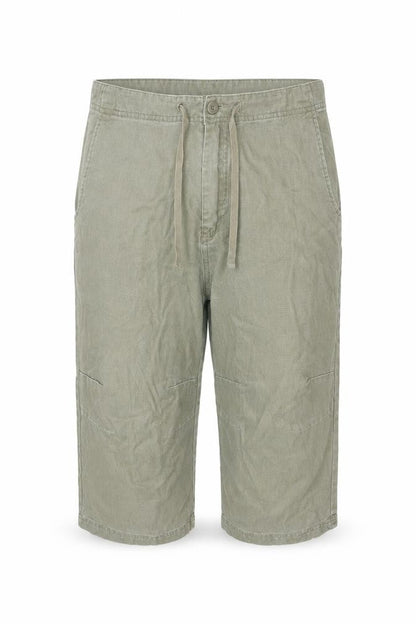 Front view of Easy Women’s Green Linen Cropped Trousers, size L, 34in Waist