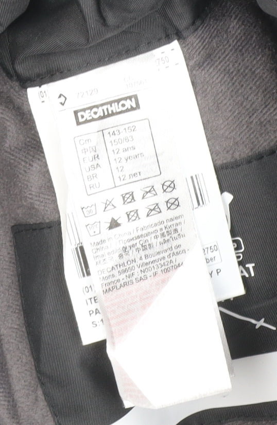 Brand and care label for Wedze boys’ black 12 years snow pants ski trousers insulated zip pockets
