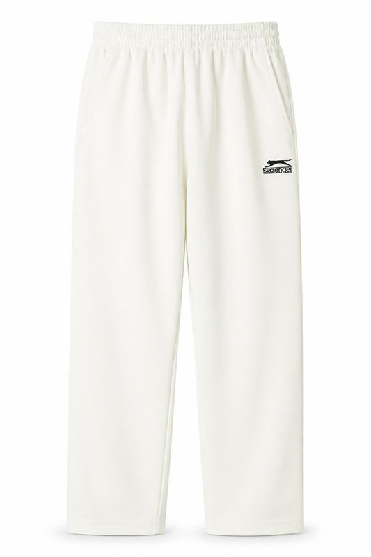 Front view of Slazenger boys’ ivory 9-10 years track pants straight leg
