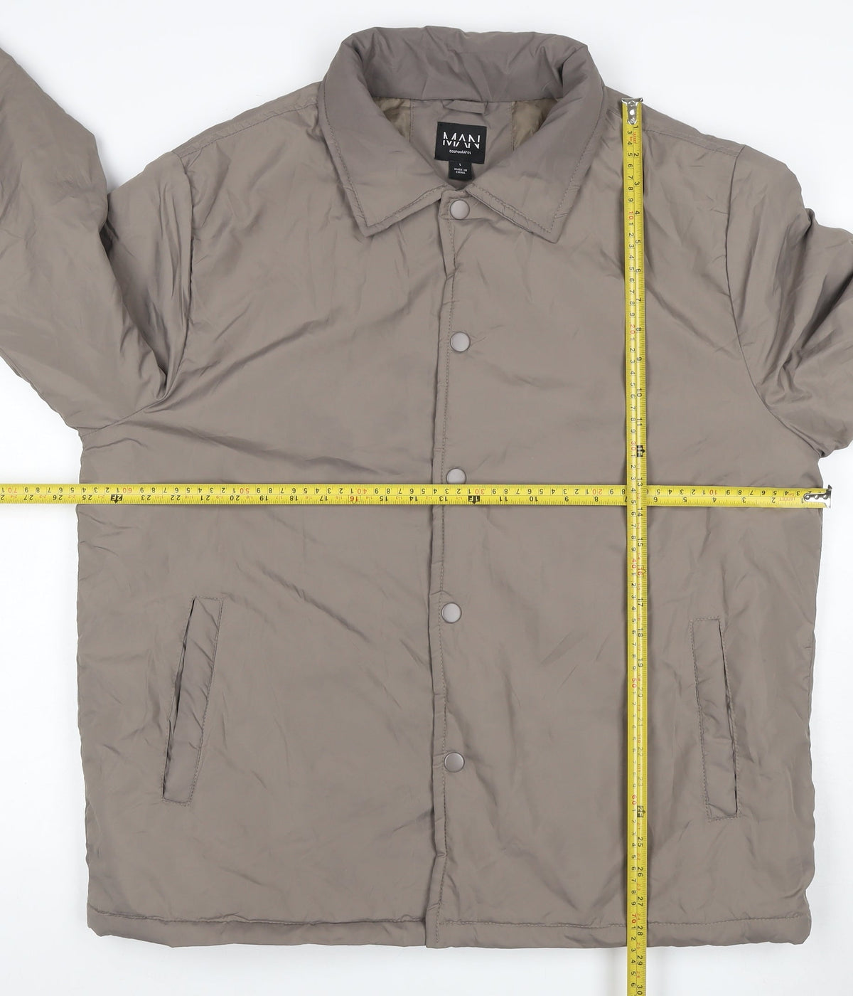 Close-up detail of boohooMAN Men’s Grey Tall L Padded Snap Button Jacket Coat