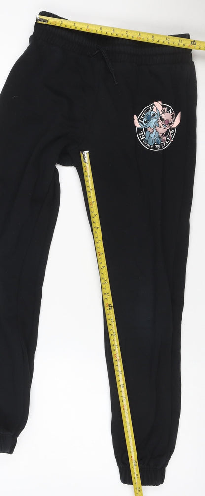 Close-up detail of Disney girls’ black 9-10 years stitch & angel jogger sweatpants