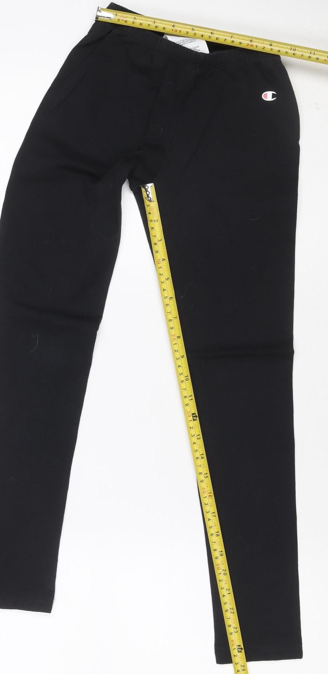 Close-up detail of Champion girls’ black 11-12 years ankle logo stretch leggings