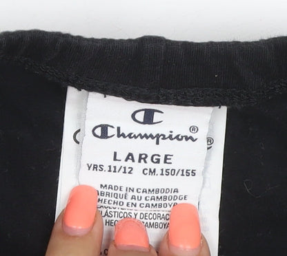 Brand and care label for Champion girls’ black 11-12 years ankle logo stretch leggings