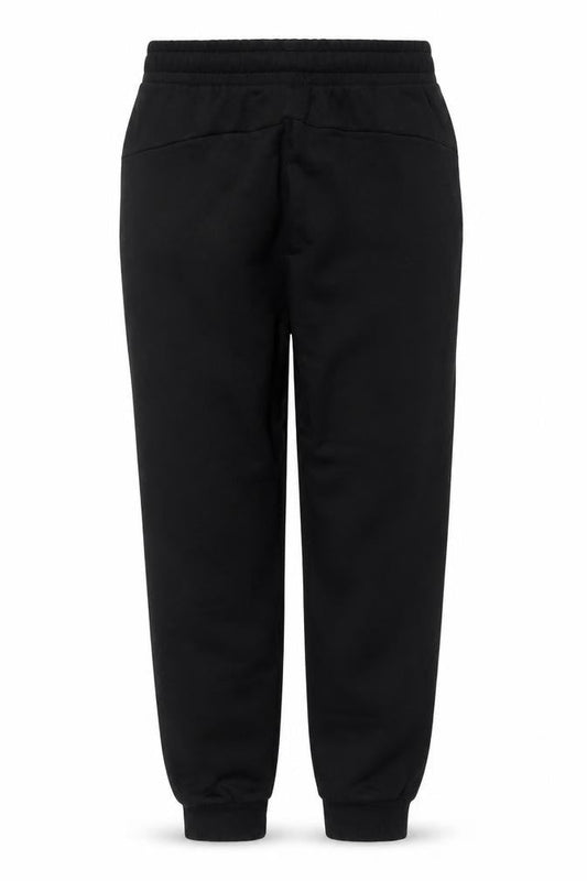 Front view of Puma boys’ black 13-14 years jogger track pants elastic waist
