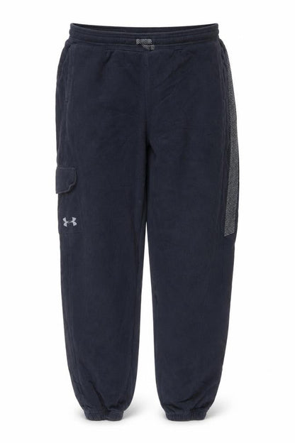 Front view of Under Armour boys’ black xl loose fit jogger track pants reflective