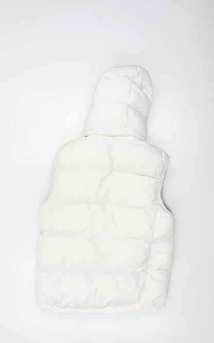 Brand and care label for Quechua girls’ white 12 years hooded padded puffer gilet waistcoat