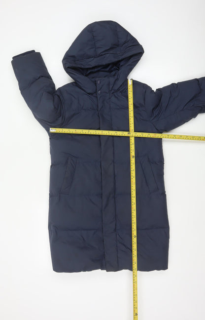 Close-up detail of Uniqlo boys’ blue 7-8 years long hooded down puffer coat