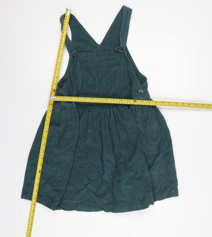 Close-up detail of Next girls’ green corduroy pinafore dress 7 years knee length cotton