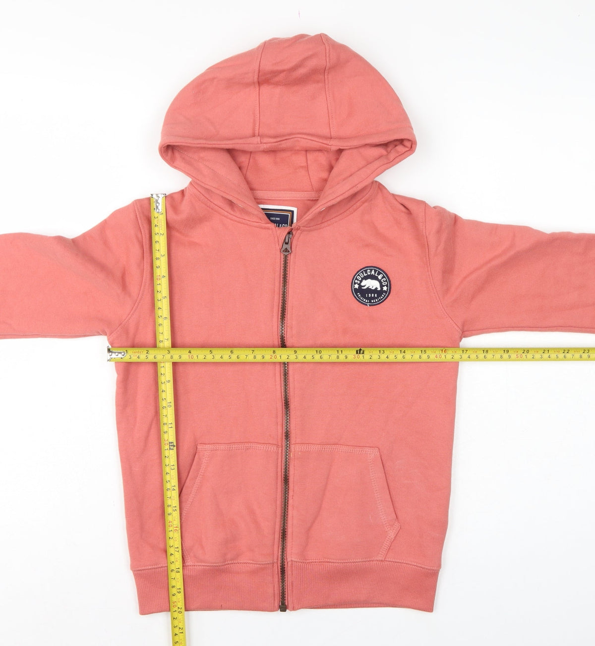 Close-up detail of SoulCal & Co boys’ pink 11-12 years full zip hooded hoodie logo