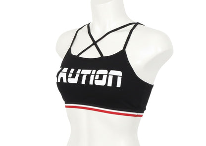 Prewornwholesale black cropped sports bra with white CAUTION graphic and red and white striped elastic hem