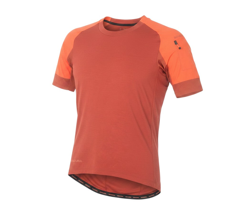 Prewornwholesale Endura women's red short sleeve cycling jersey with raglan sleeves and a zippered pocket.