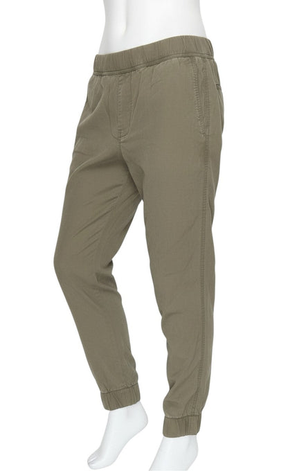 Prewornwholesale Gap women's green lyocell jogger trousers with an elastic waistband and tapered fit on a mannequin.
