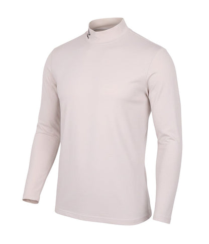 Prewornwholesale Umbro beige long sleeve activewear top with a mock neck collar and subtle branding